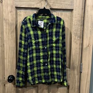 Green and blue flannel shirt. Light